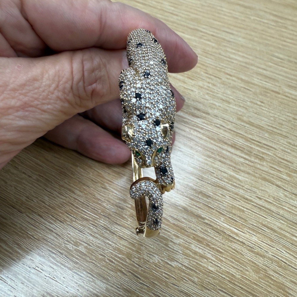 Gold Panther Bracelet with diamonds/sapphires/emerald eyes